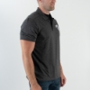The black polo shirt, viewed from the side.