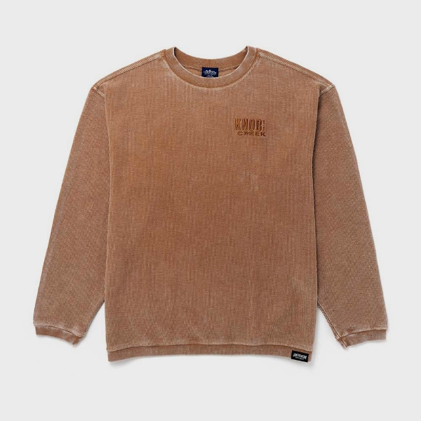 Image of a burnt orange sweater with dark orange Knob Creek logo on front